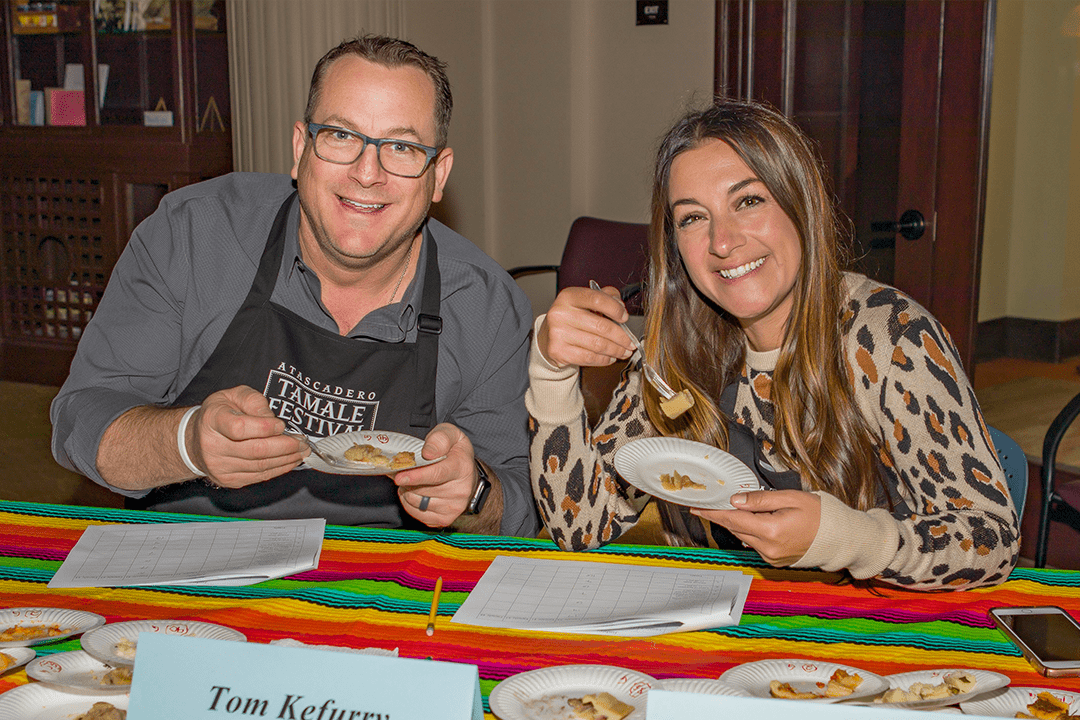 Image of 2020 Tamale Festival Tamale Judges Tom Kefurry and Becky Kingman poised to sample a bite of tamale.